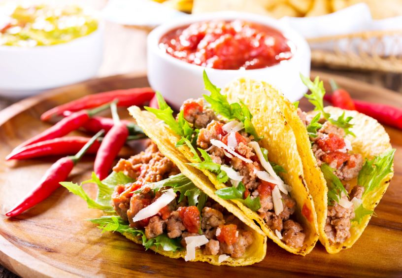 Beef tacos on a plate with salsa